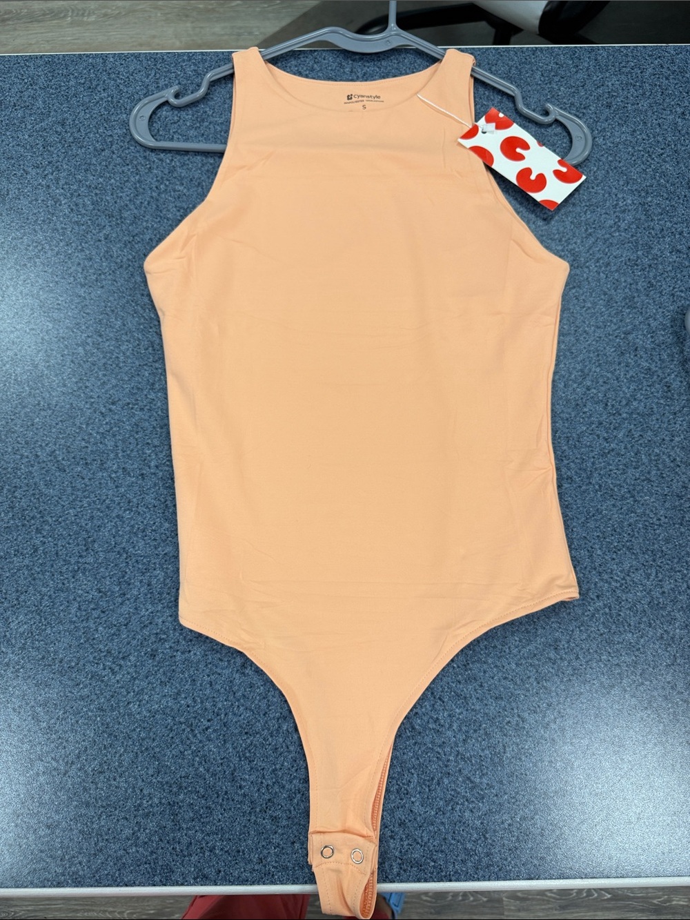 Sleeveless Peach Bodysuit - Picture 1 of 1